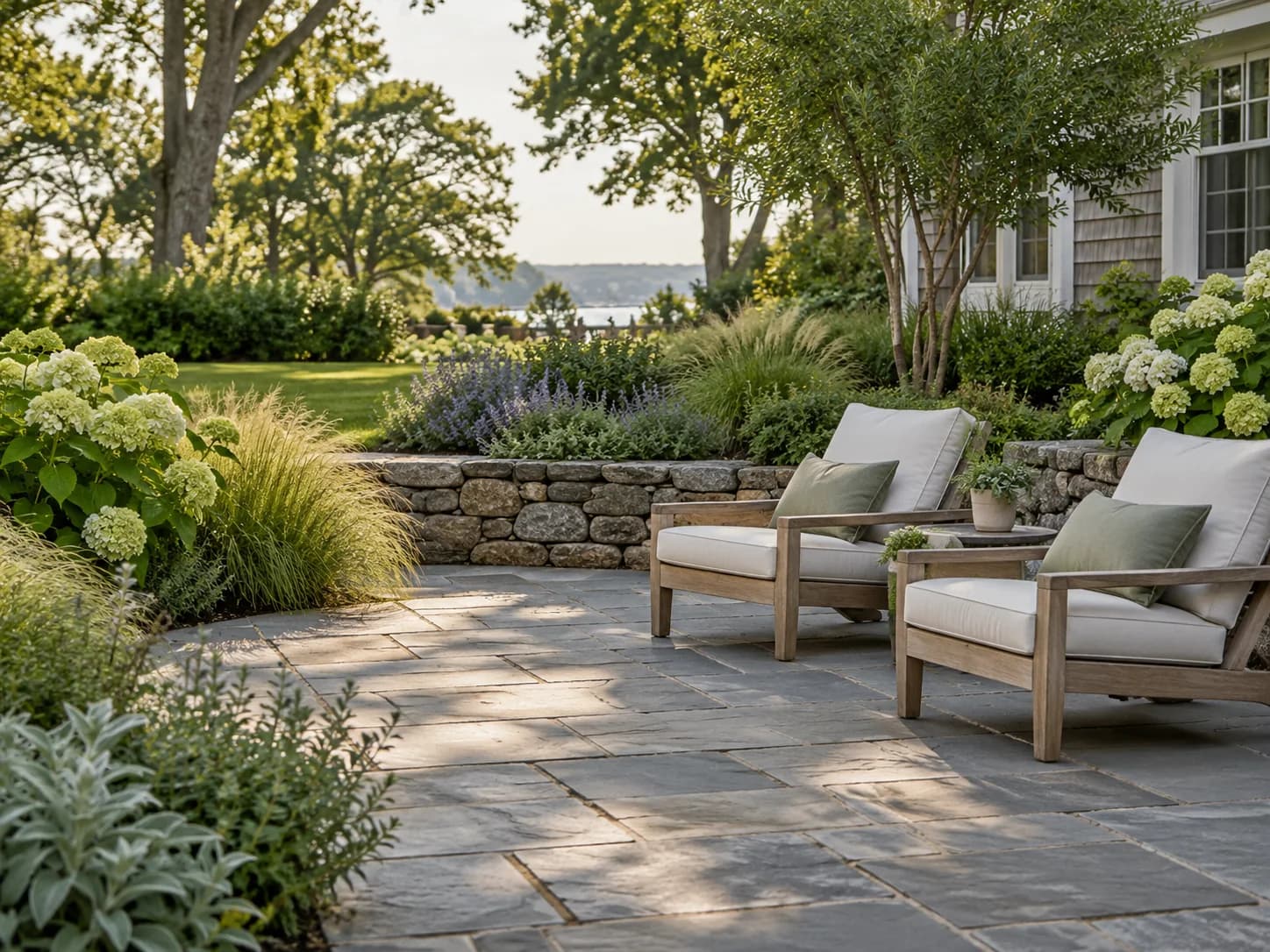 Bluestone terrace with a low stone wall
